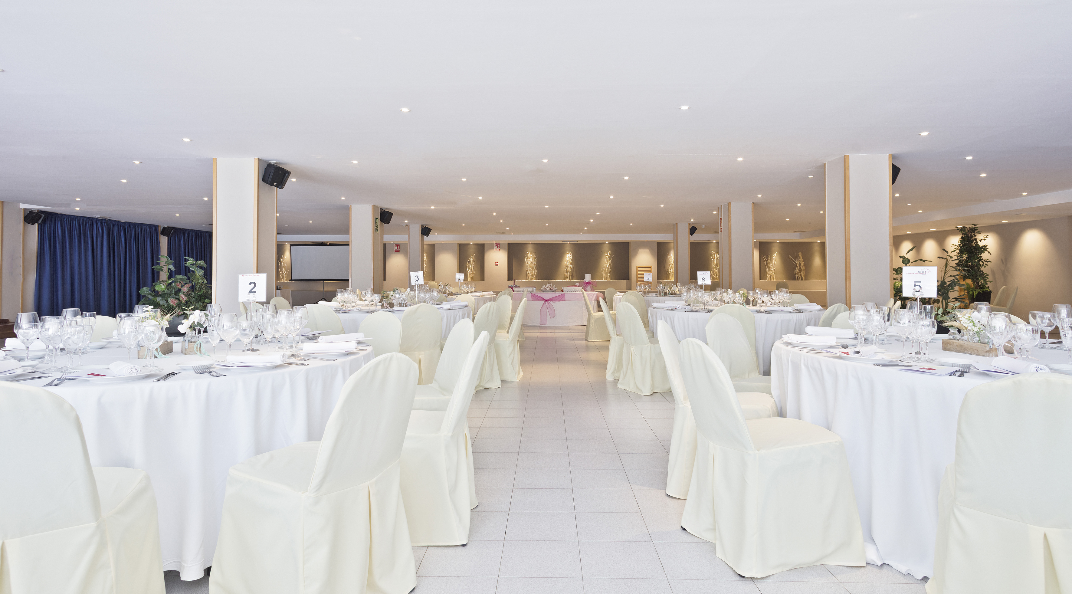 a room with tables and chairs