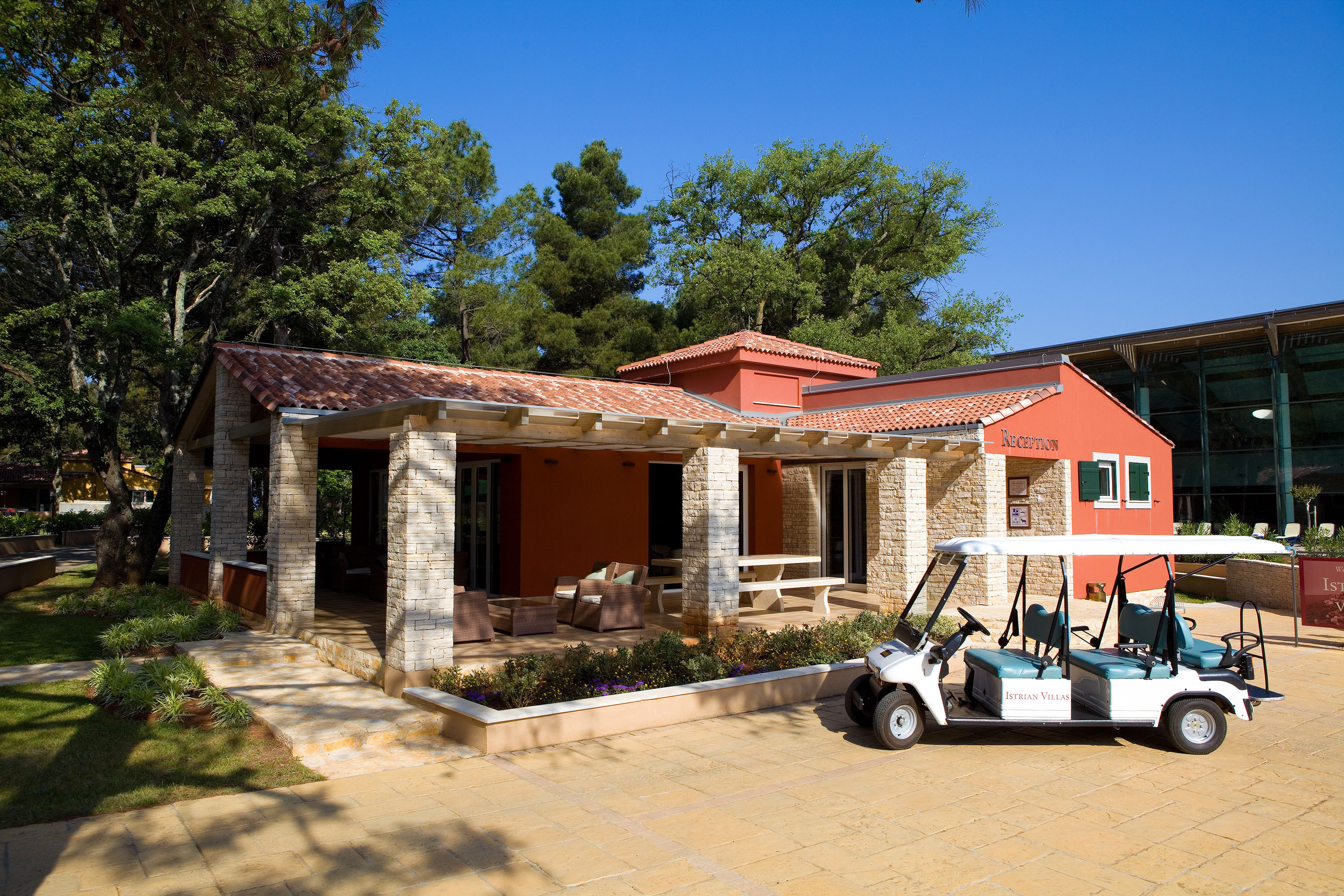 a golf cart parked outside of a house