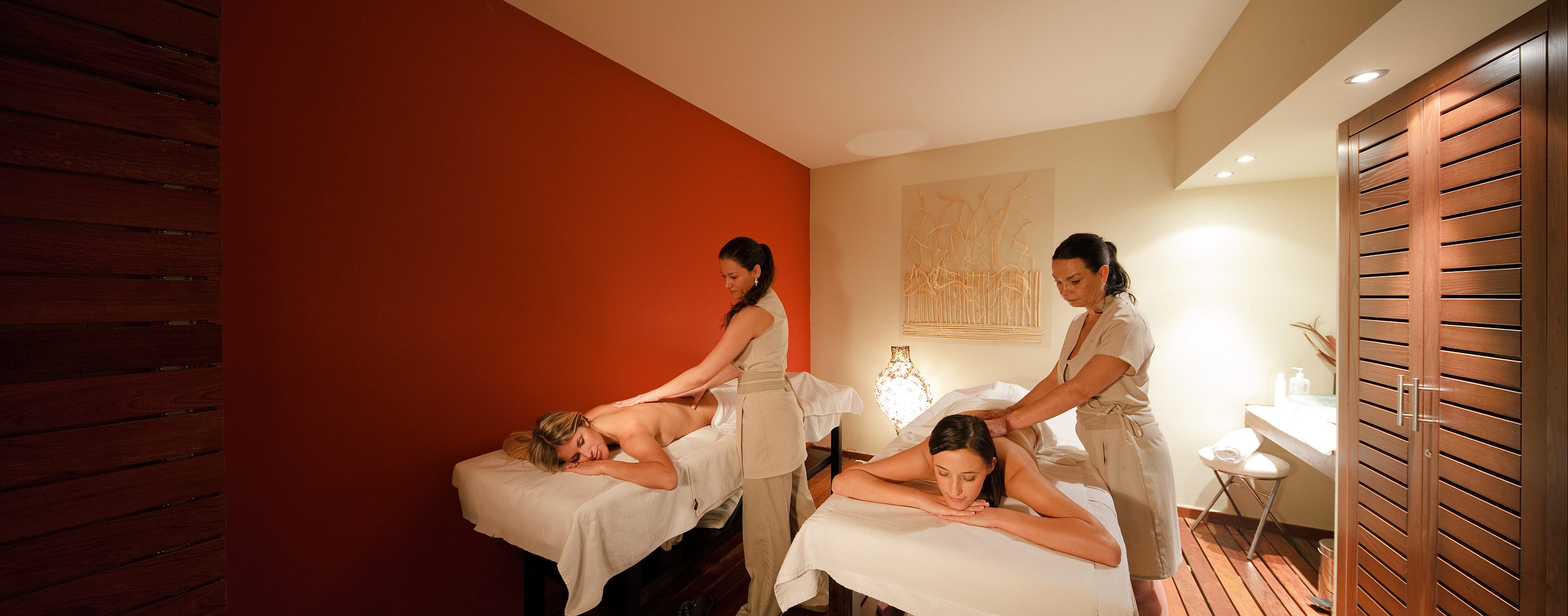 a group of women getting massage