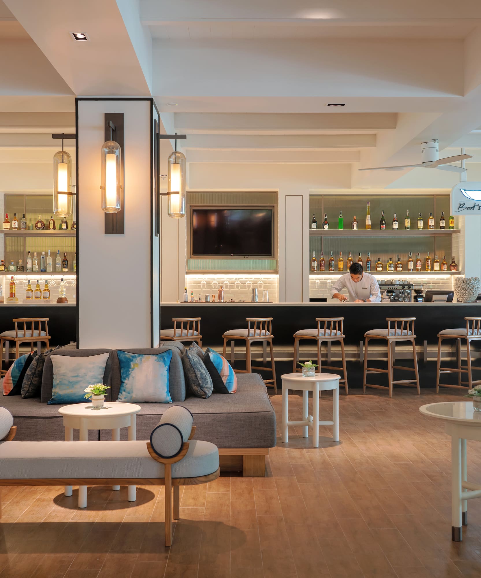 a room with a bar and a couch