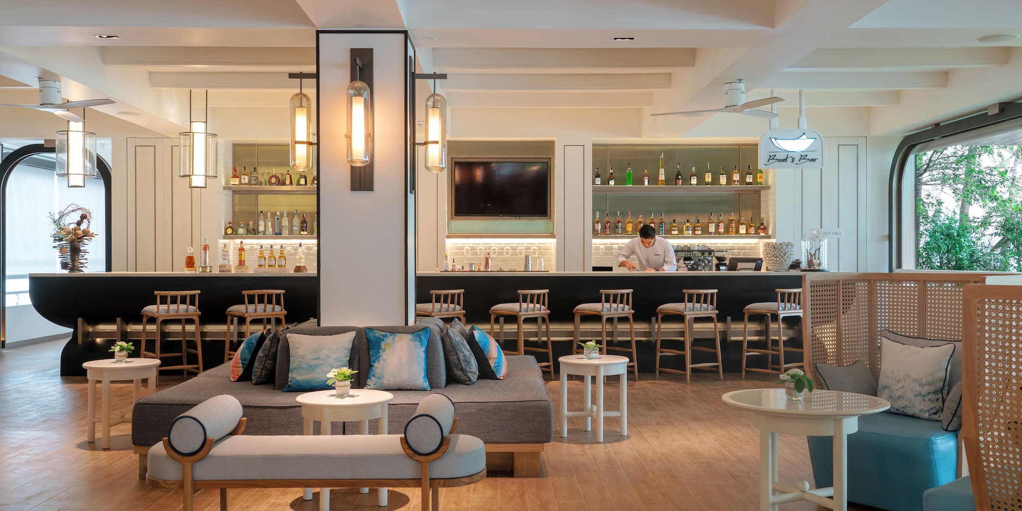 a room with a bar and a couch