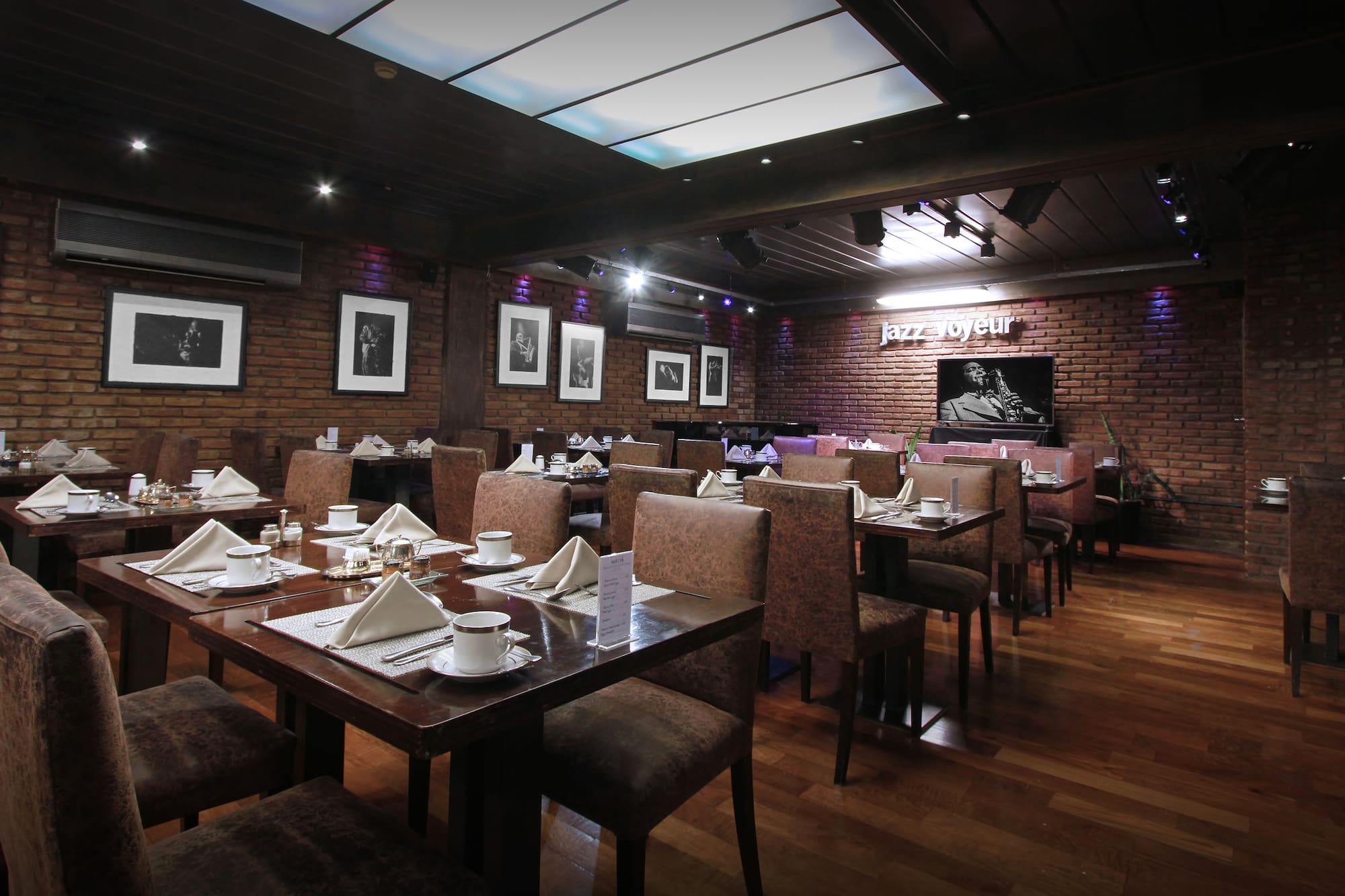 a restaurant with tables and chairs