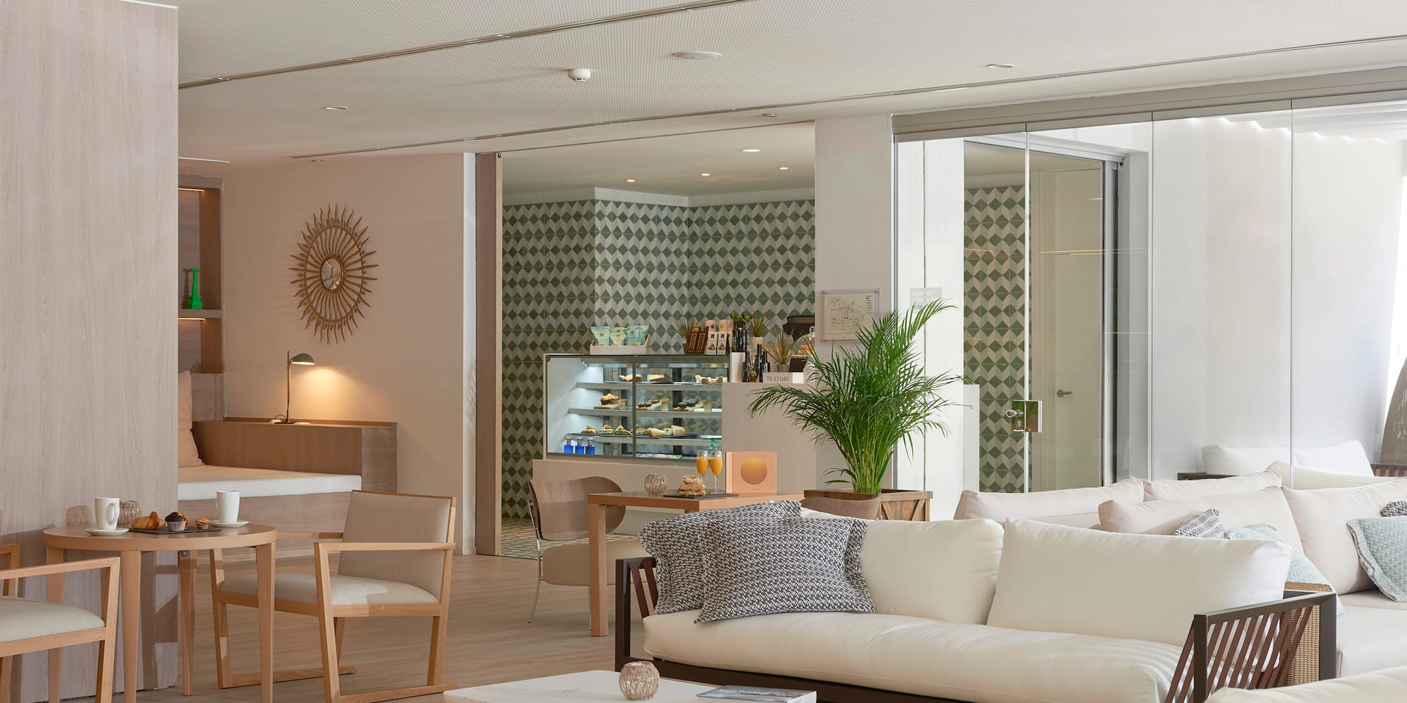 a living room with a white couch and a table