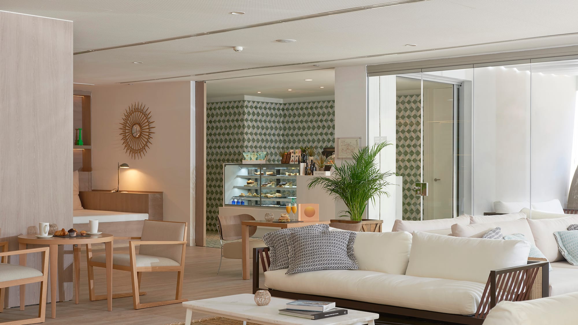 a living room with a white couch and a table