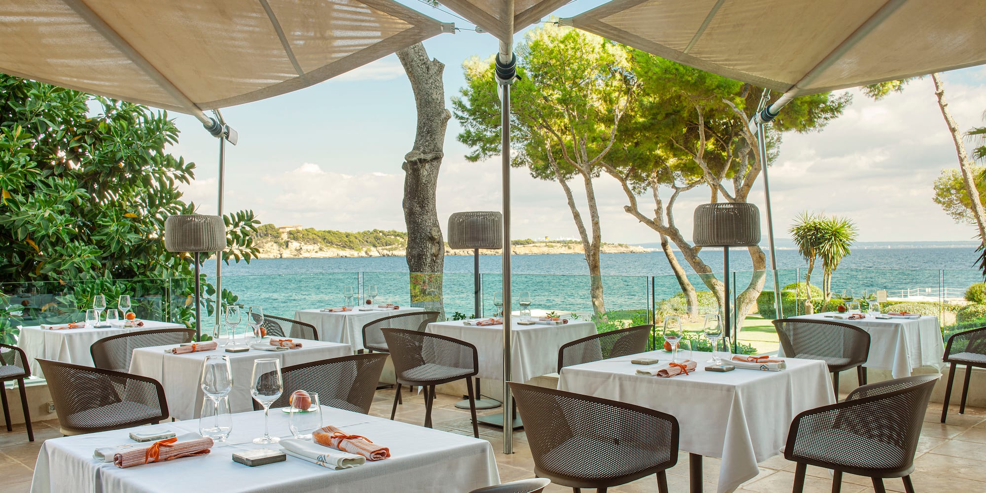a restaurant with tables and chairs