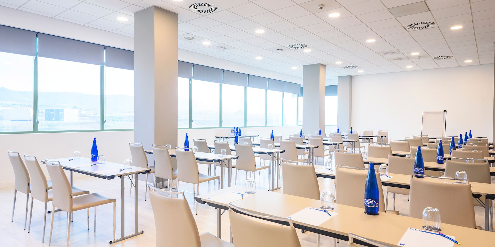 a room with tables and chairs