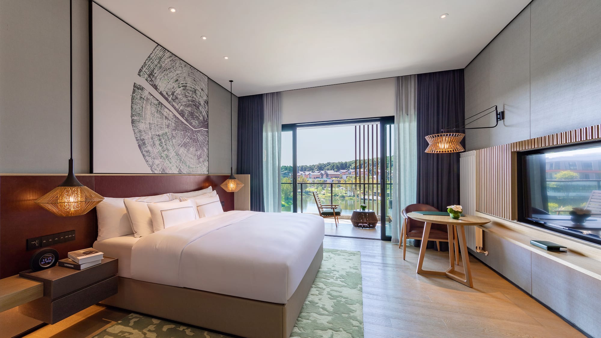 a bedroom with a bed and a table