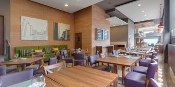 a room with tables and chairs