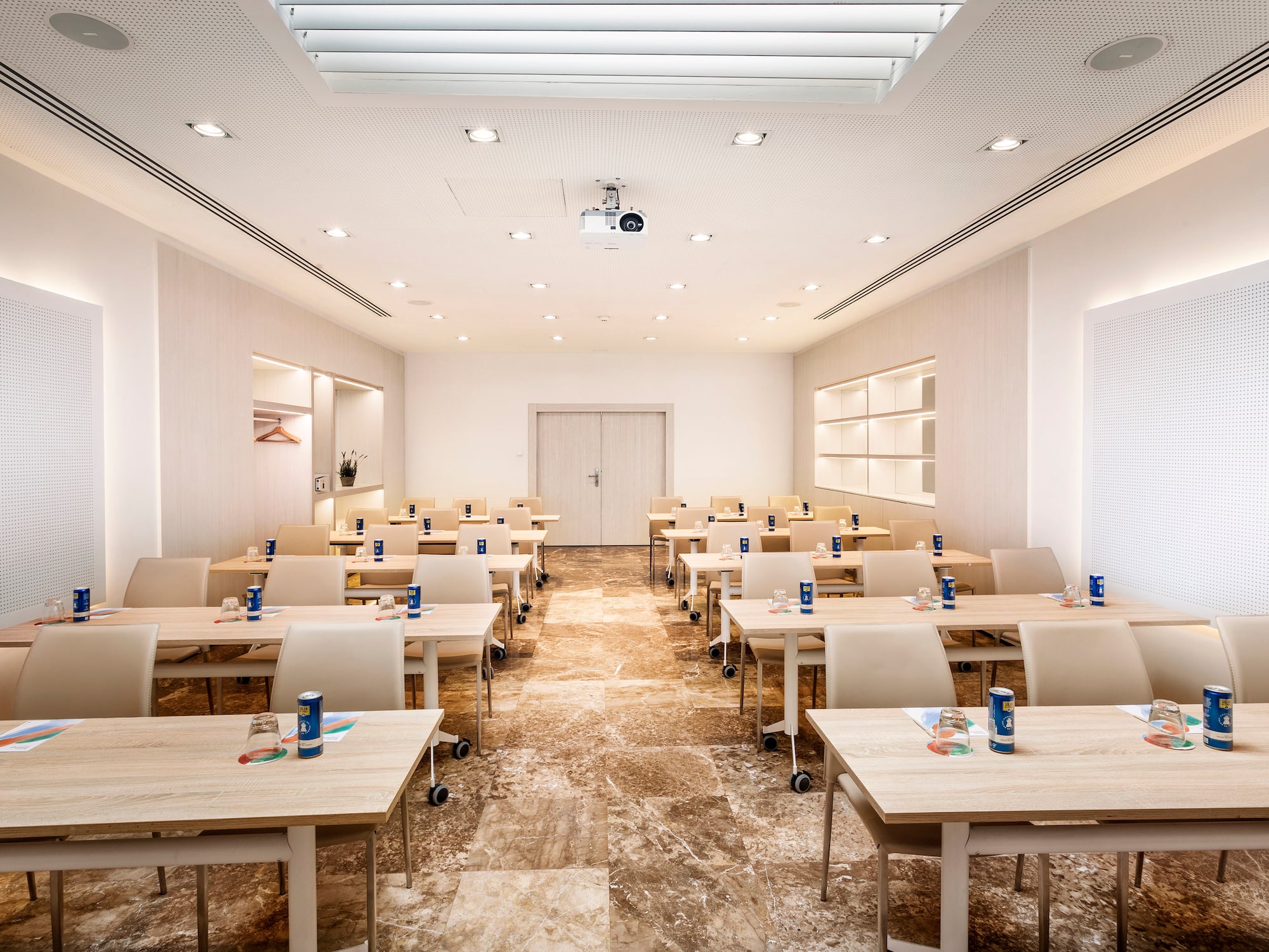 a room with tables and chairs