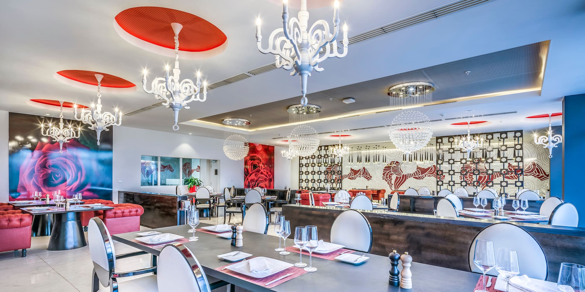 a restaurant with tables and chairs