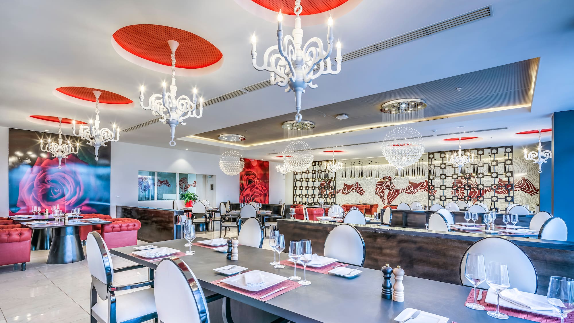 a restaurant with tables and chairs