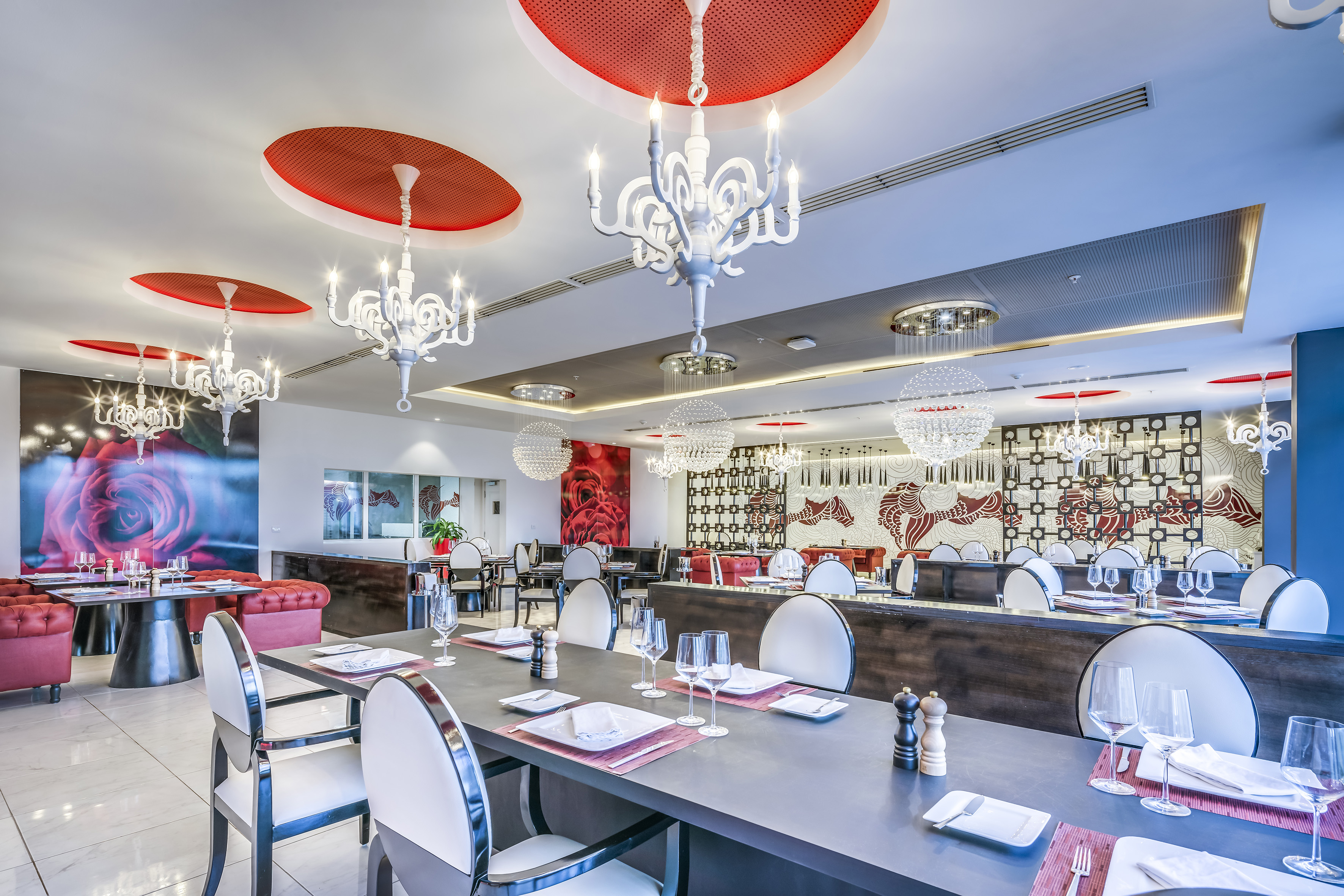 a restaurant with tables and chairs