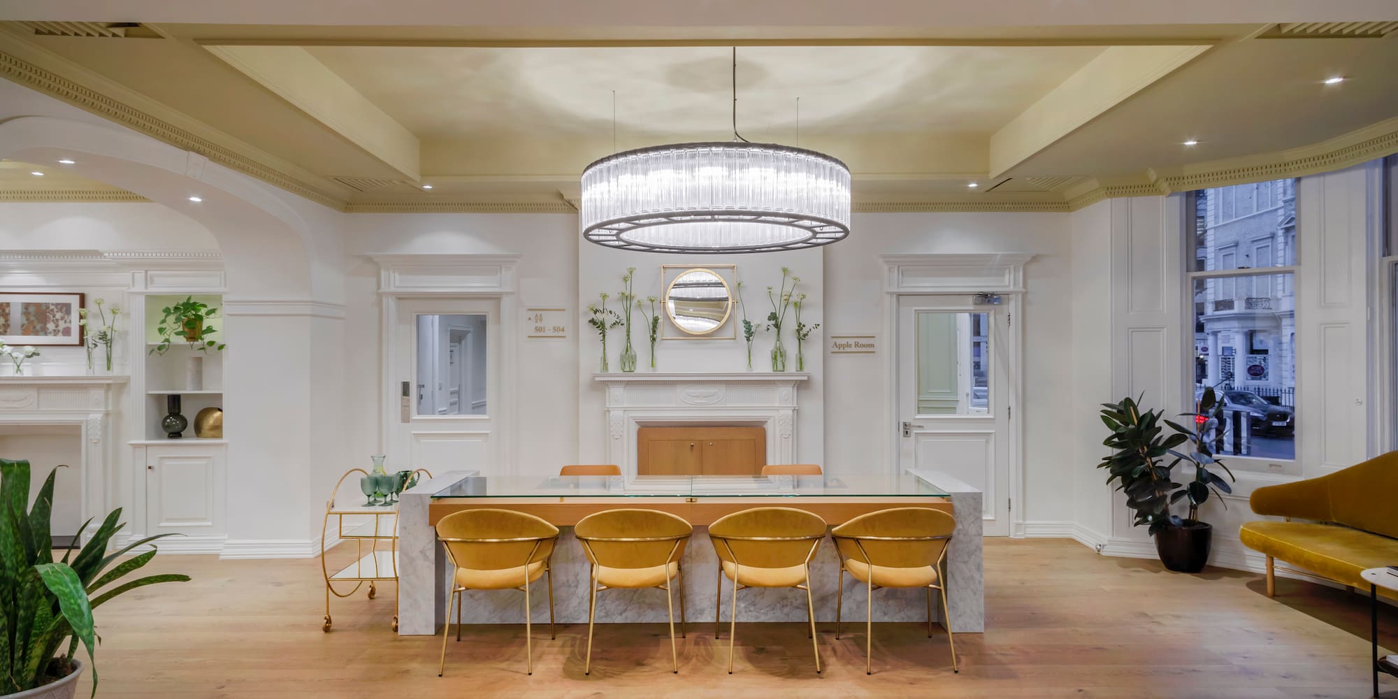 a room with a table and chairs