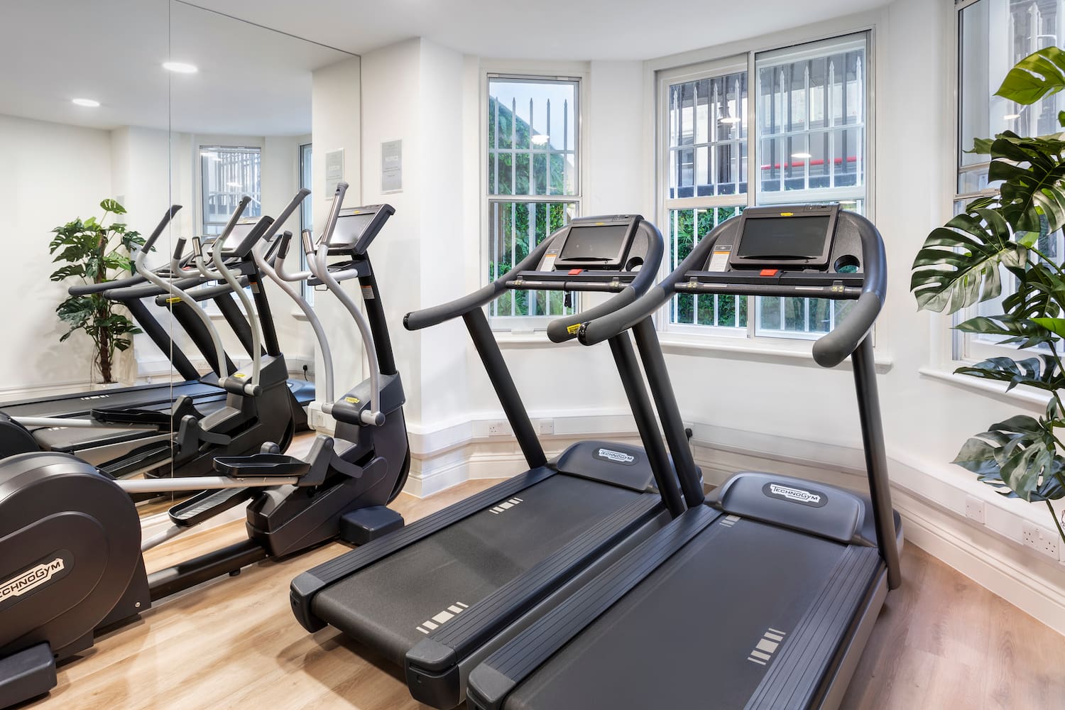 a group of treadmills in a room