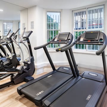 a group of treadmills in a room