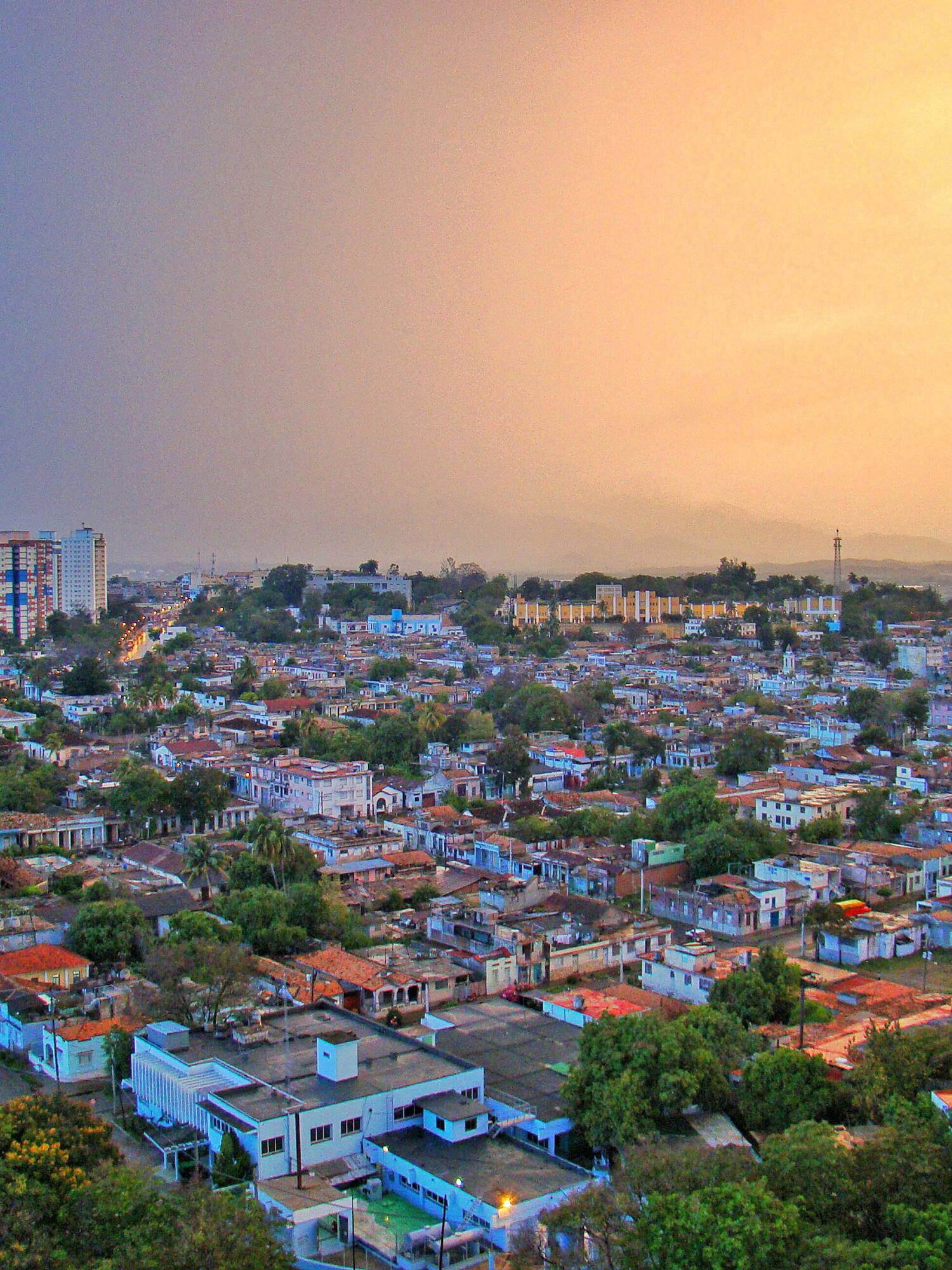 a city with many buildings and trees