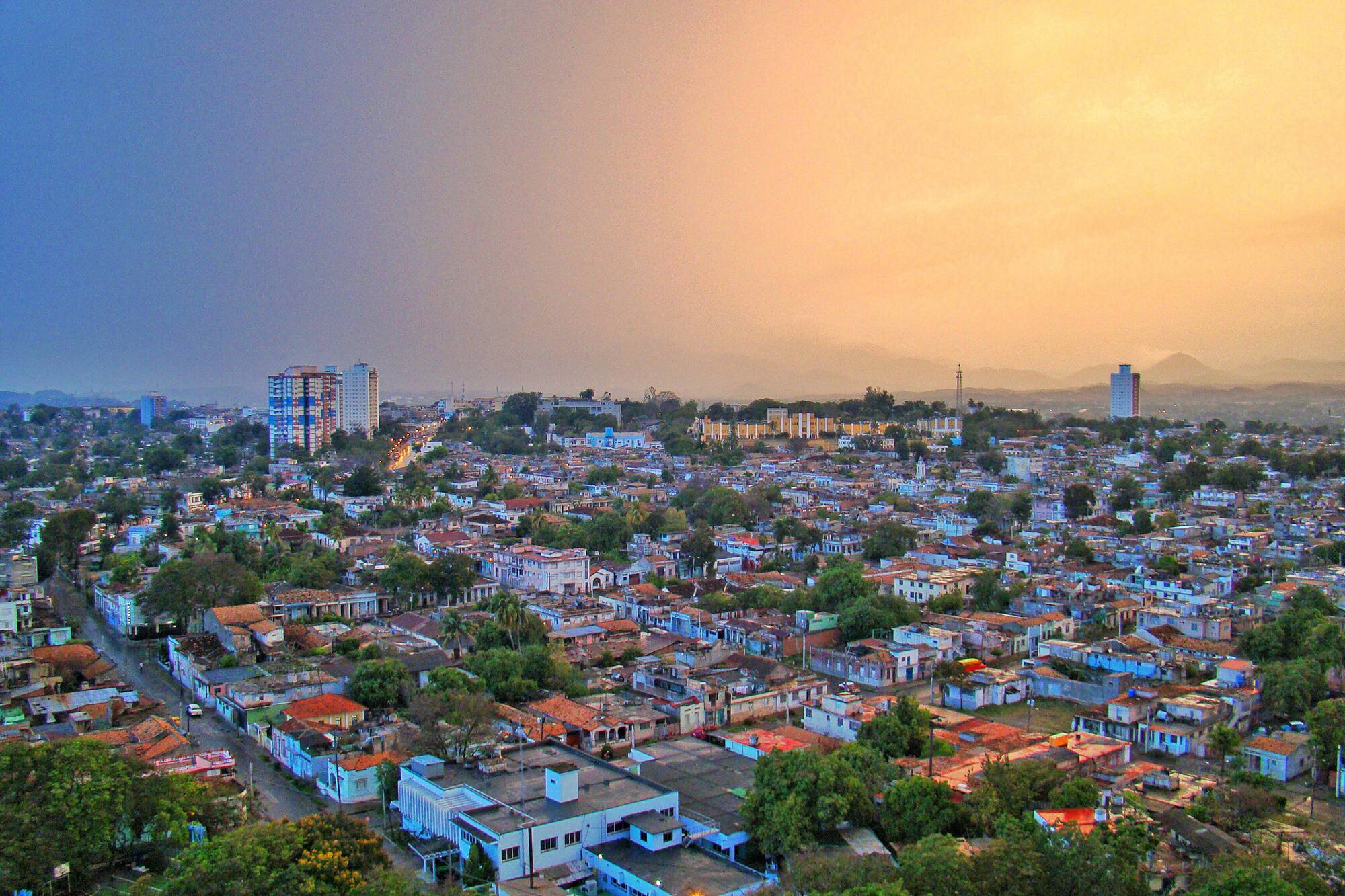 a city with many buildings and trees