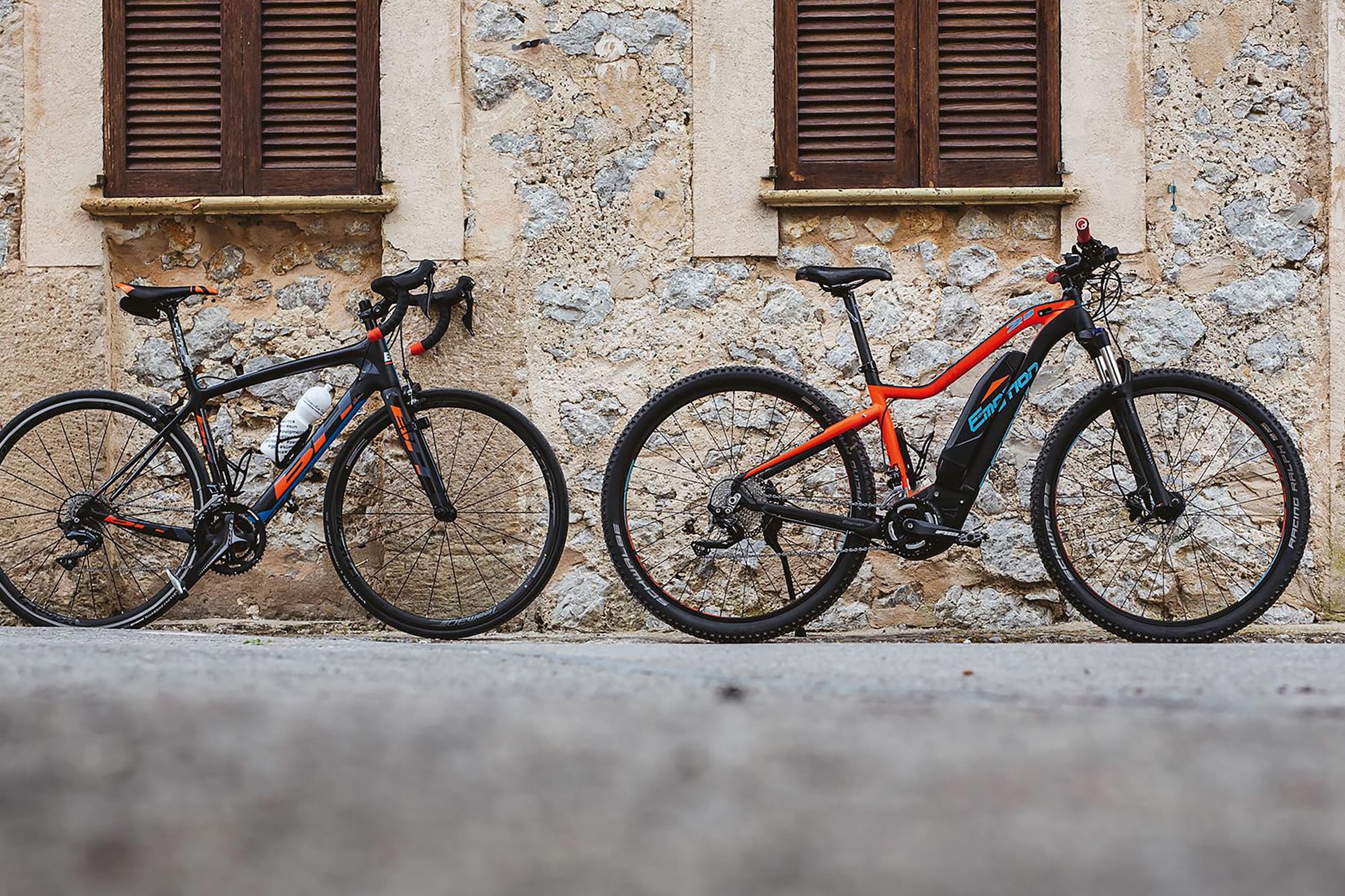two bicycles parked next to each other