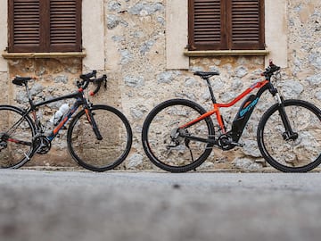 two bicycles parked next to each other