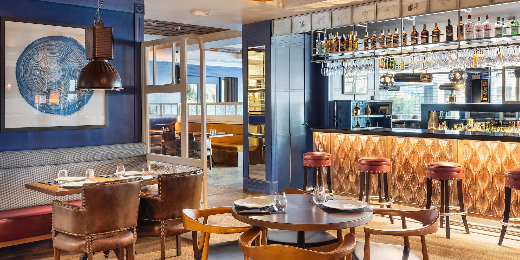 a restaurant with tables and chairs