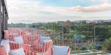 a group of chairs on a rooftop