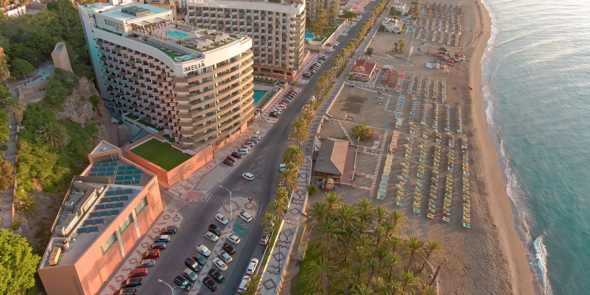 a aerial view of a beach and buildings