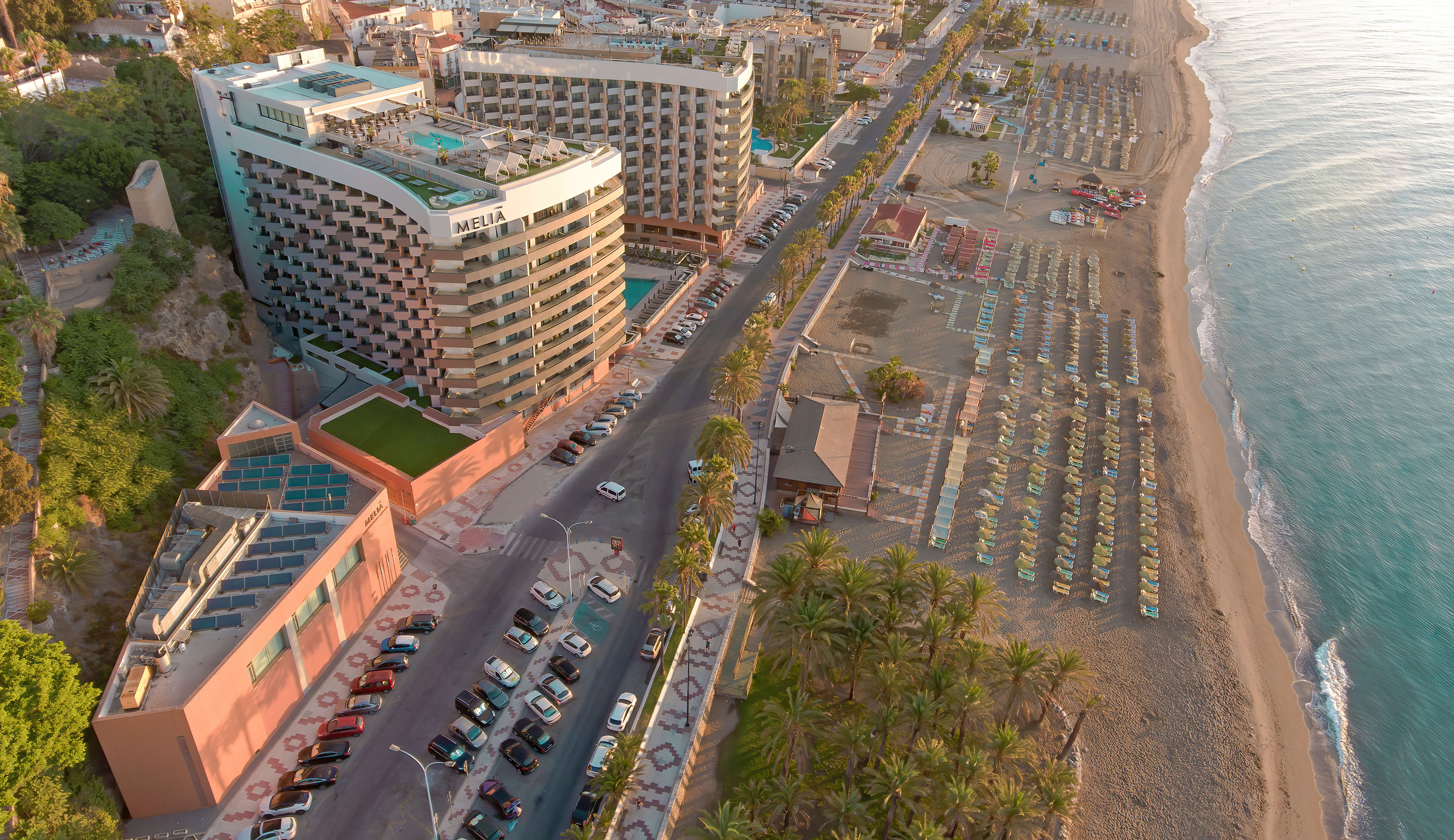 a aerial view of a beach and buildings