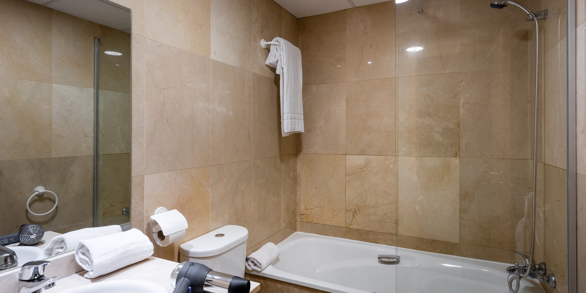 a bathroom with a bathtub and a sink