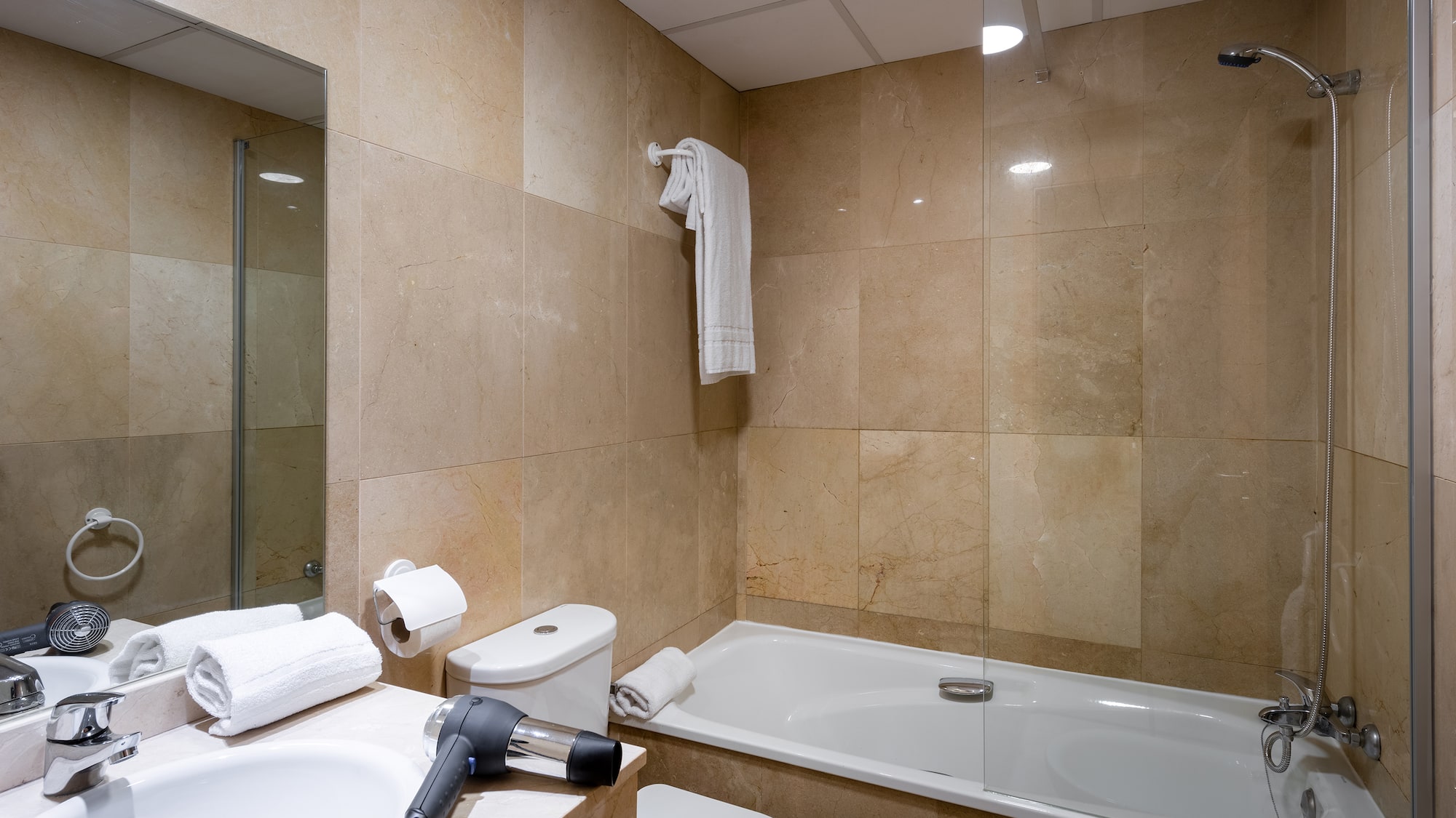 a bathroom with a bathtub and a sink