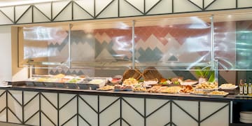 a buffet with food on it