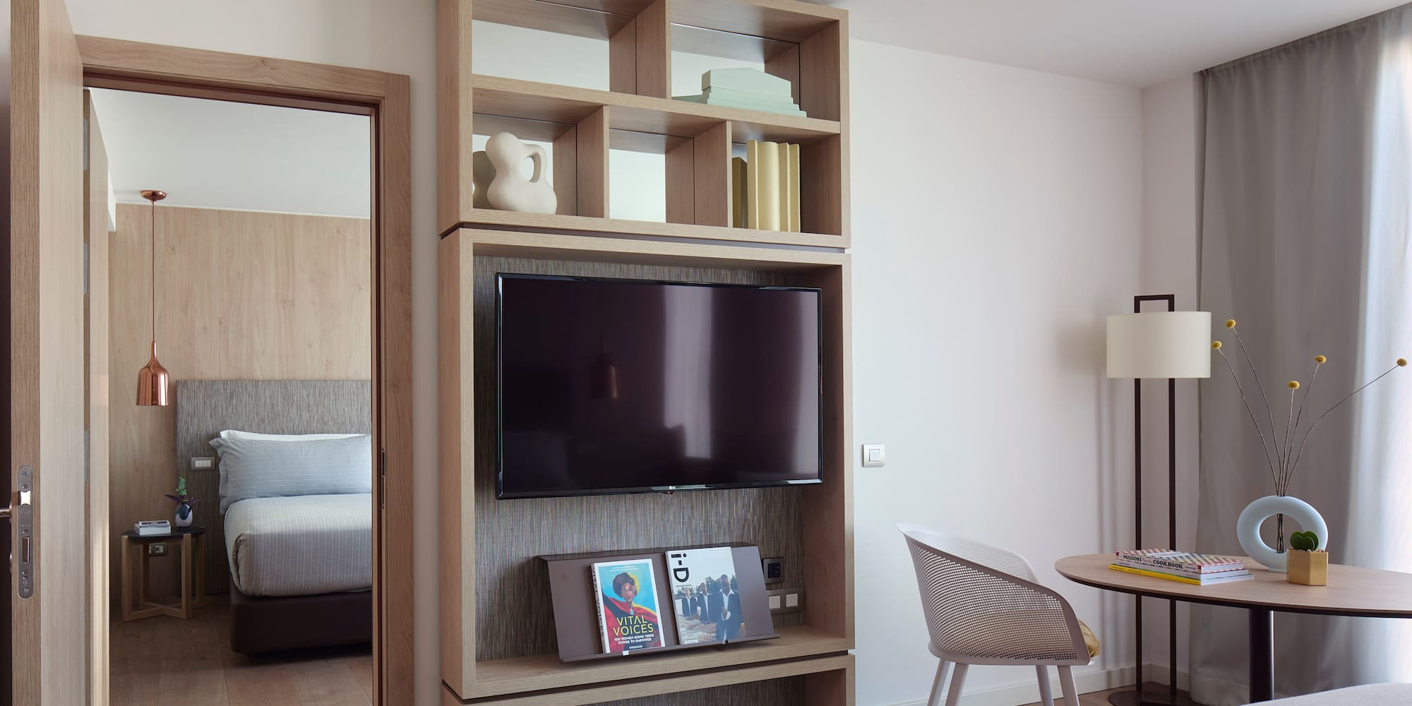 a tv on a shelf in a room