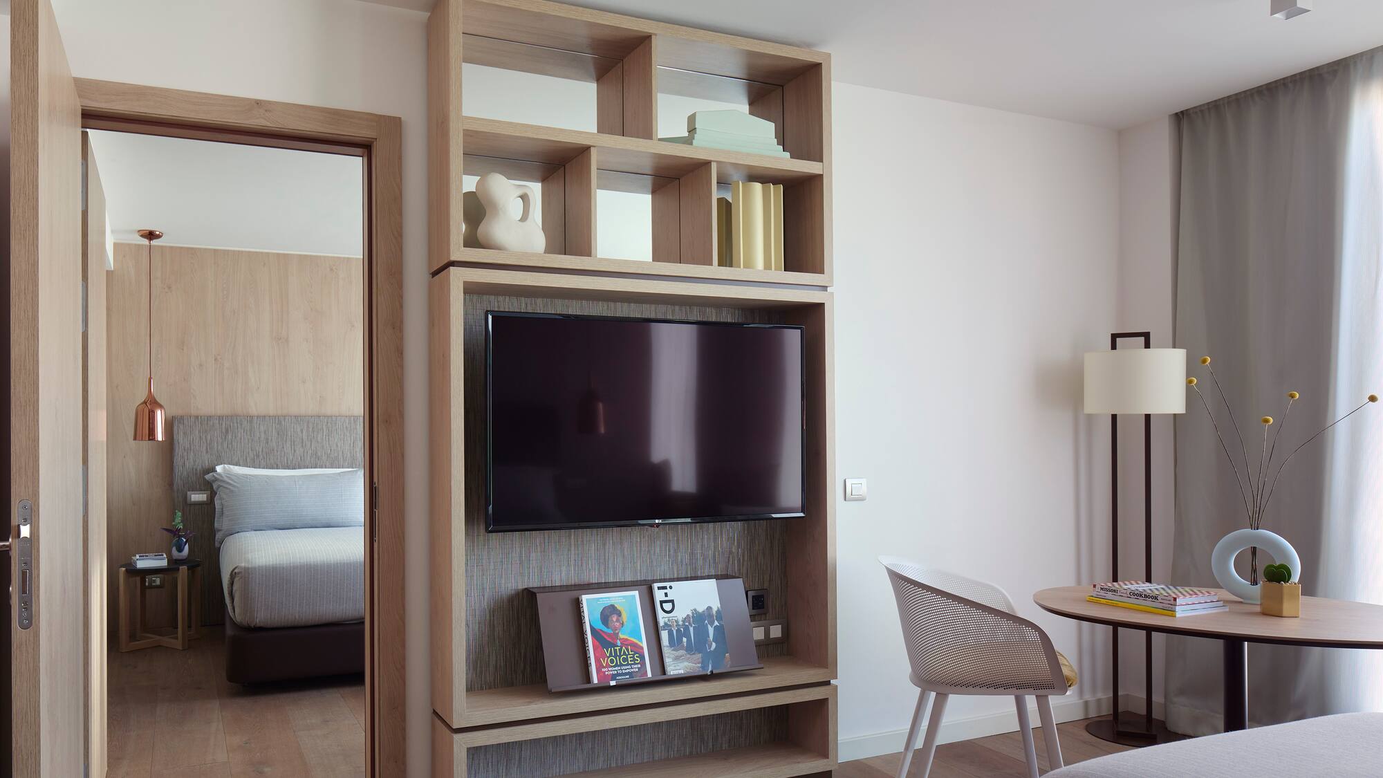 a tv on a shelf in a room
