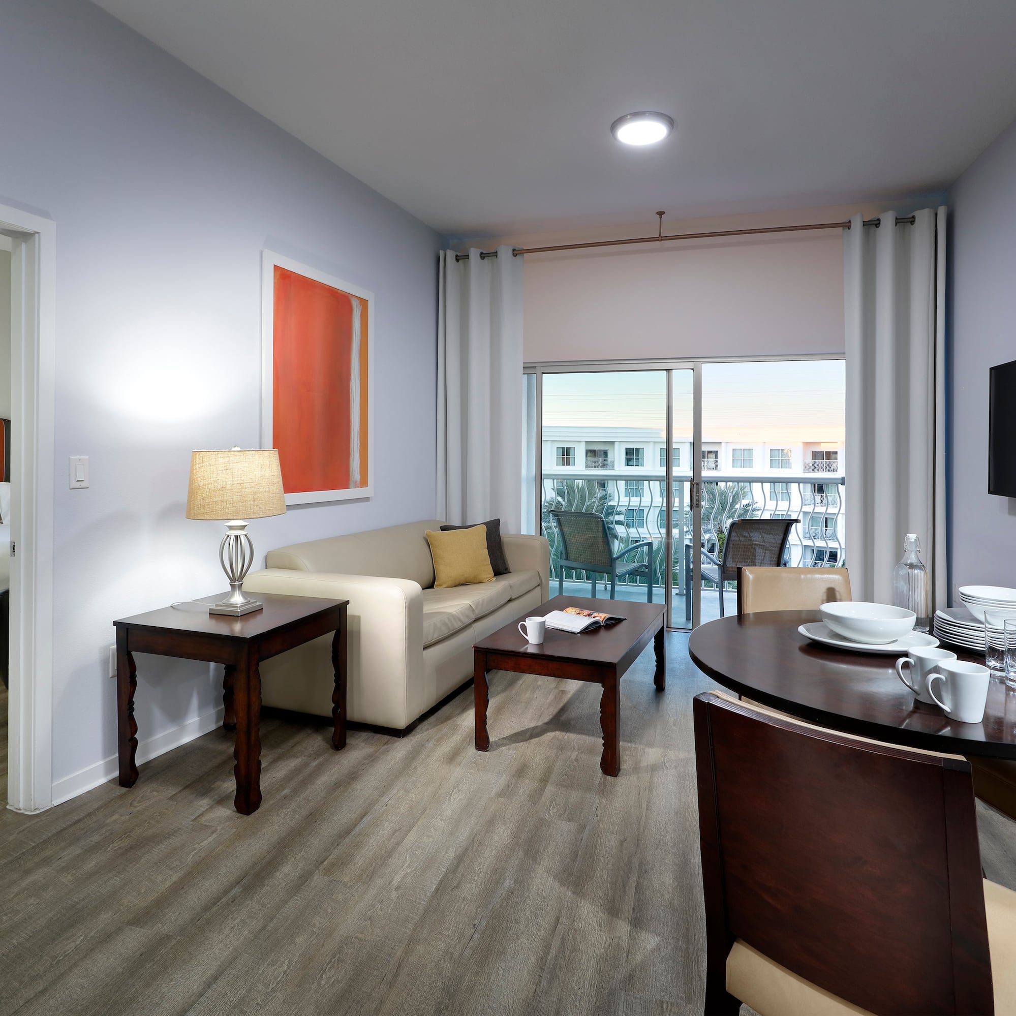 a living room with a couch and table