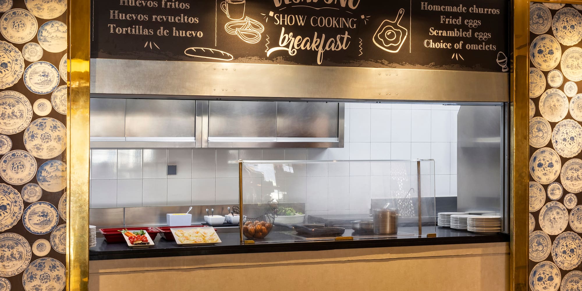 a kitchen with a sign above it