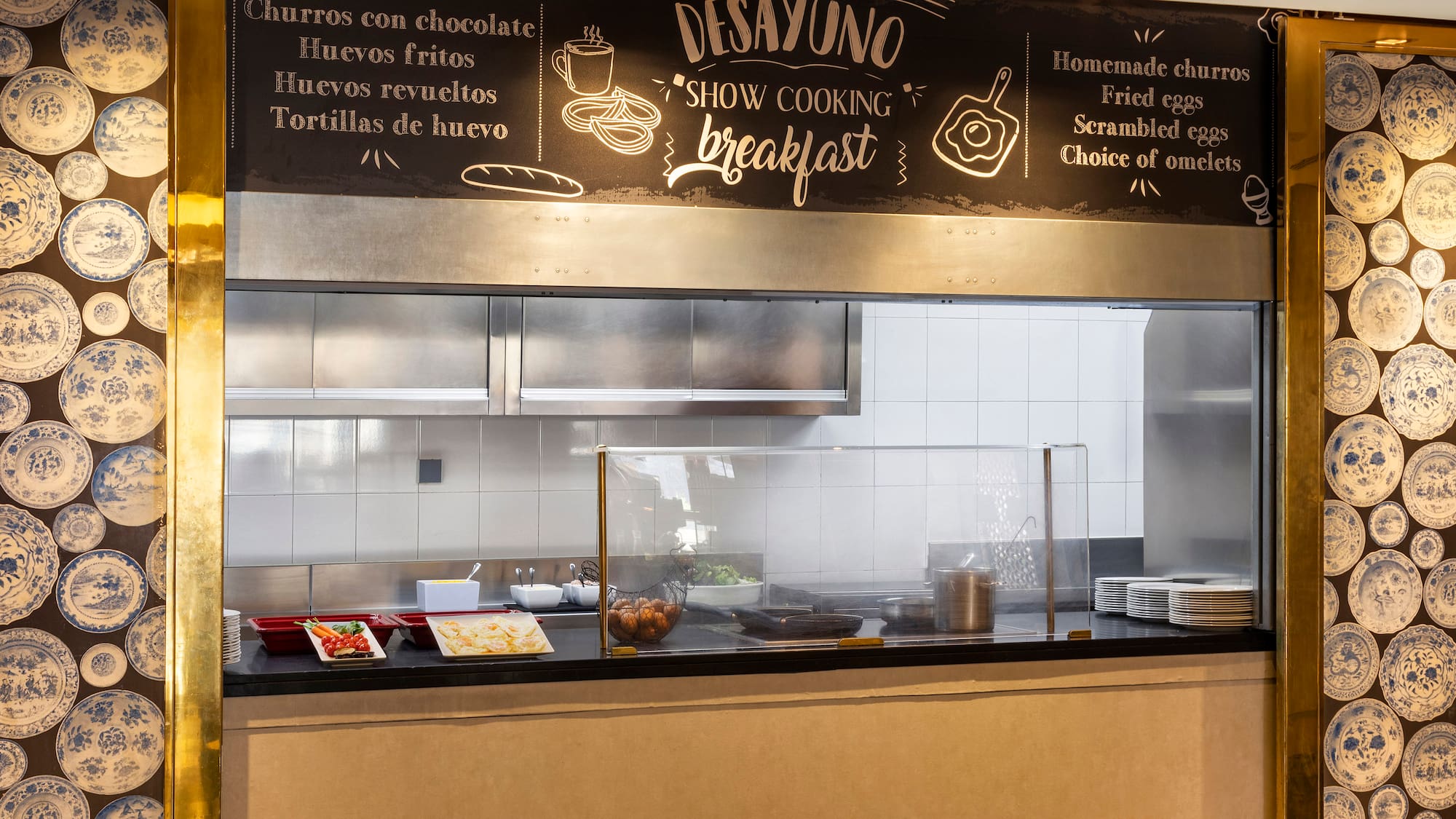 a kitchen with a sign above it