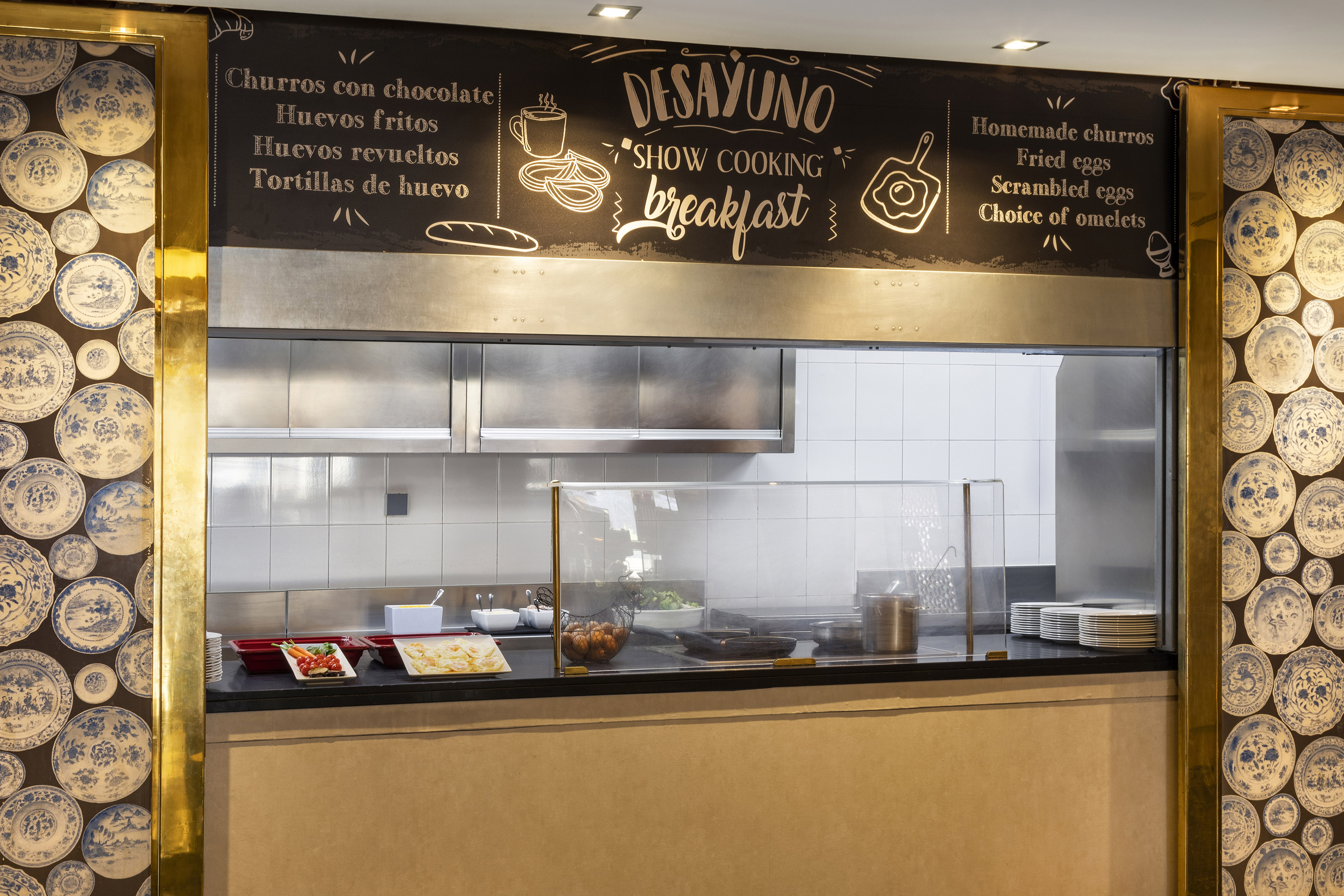 a kitchen with a sign above it