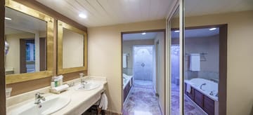 a bathroom with marble floor and sink