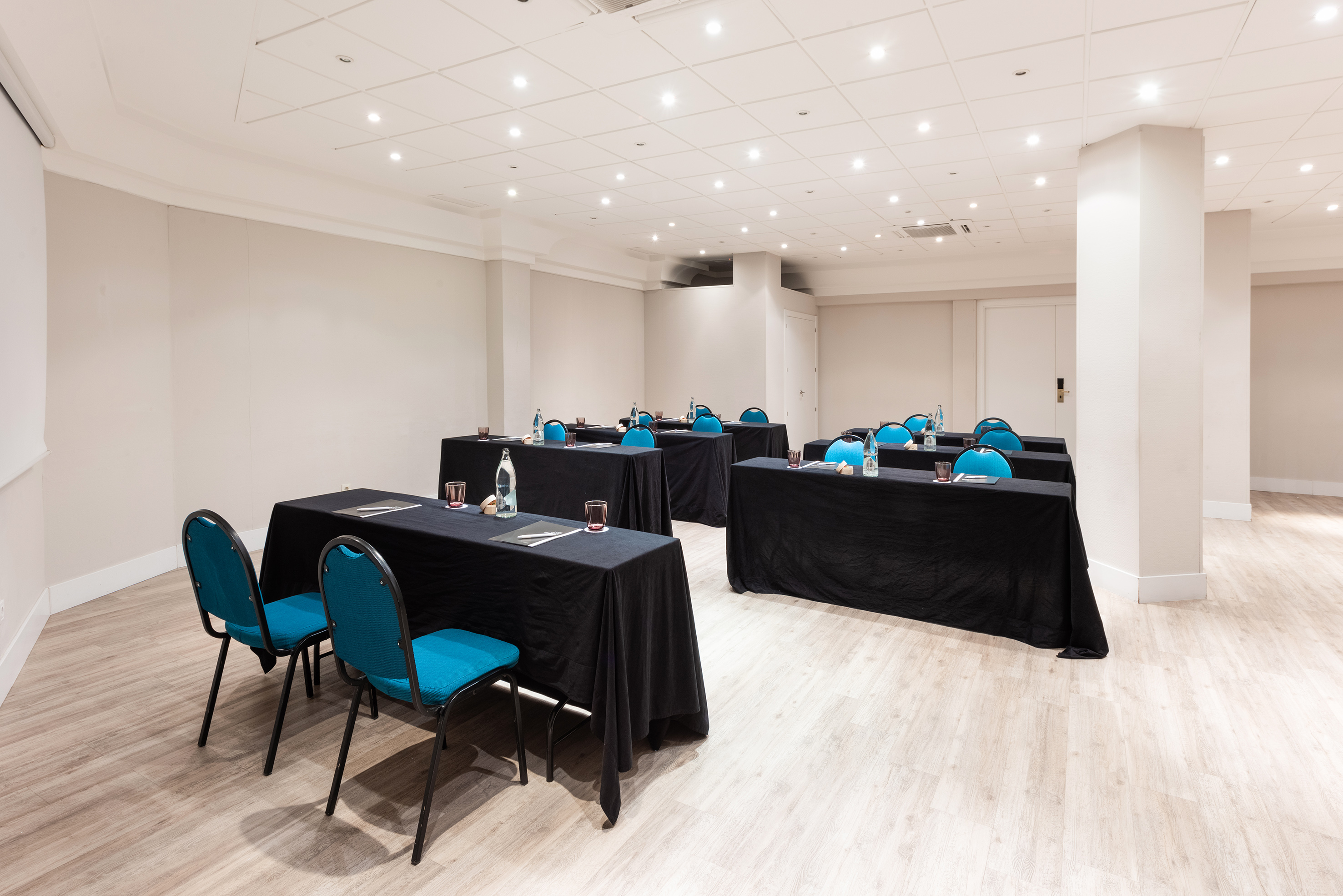 a room with tables and chairs