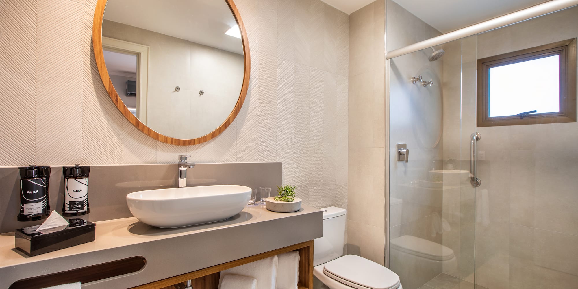 a bathroom with a mirror and sink