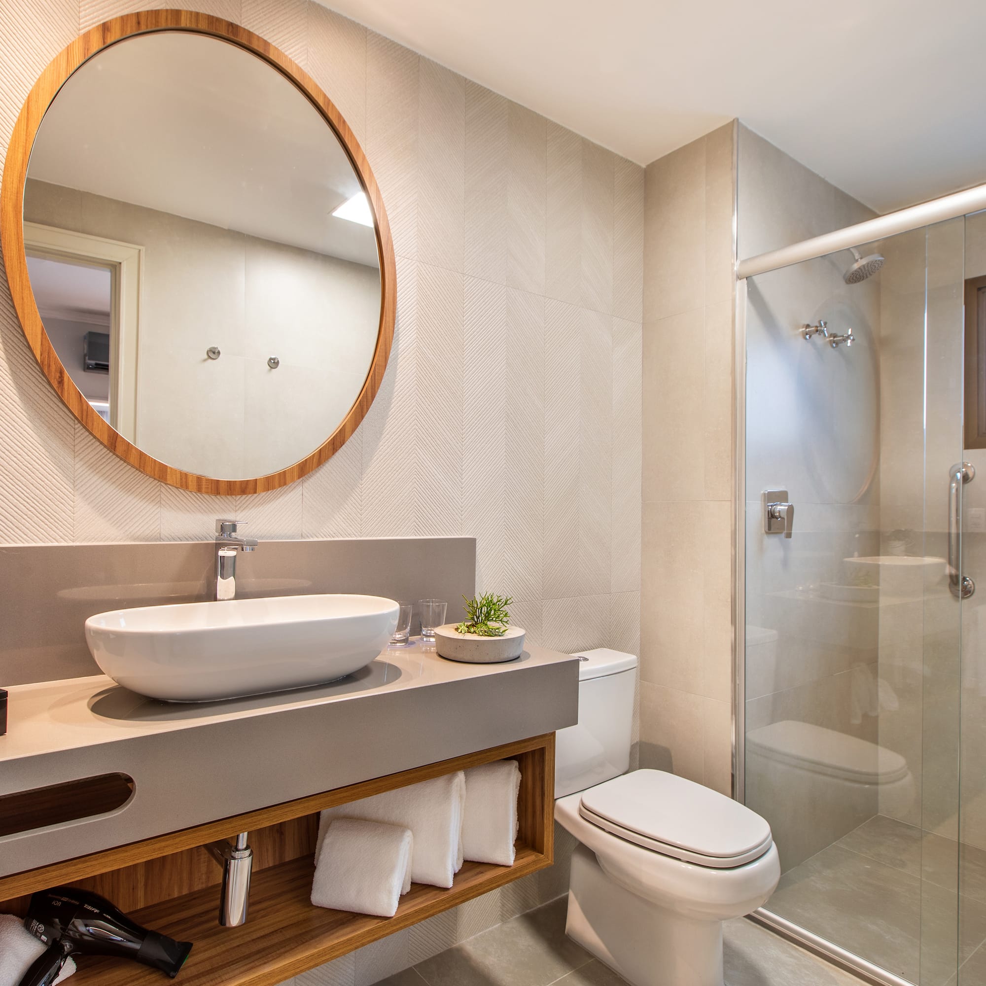 a bathroom with a mirror and sink