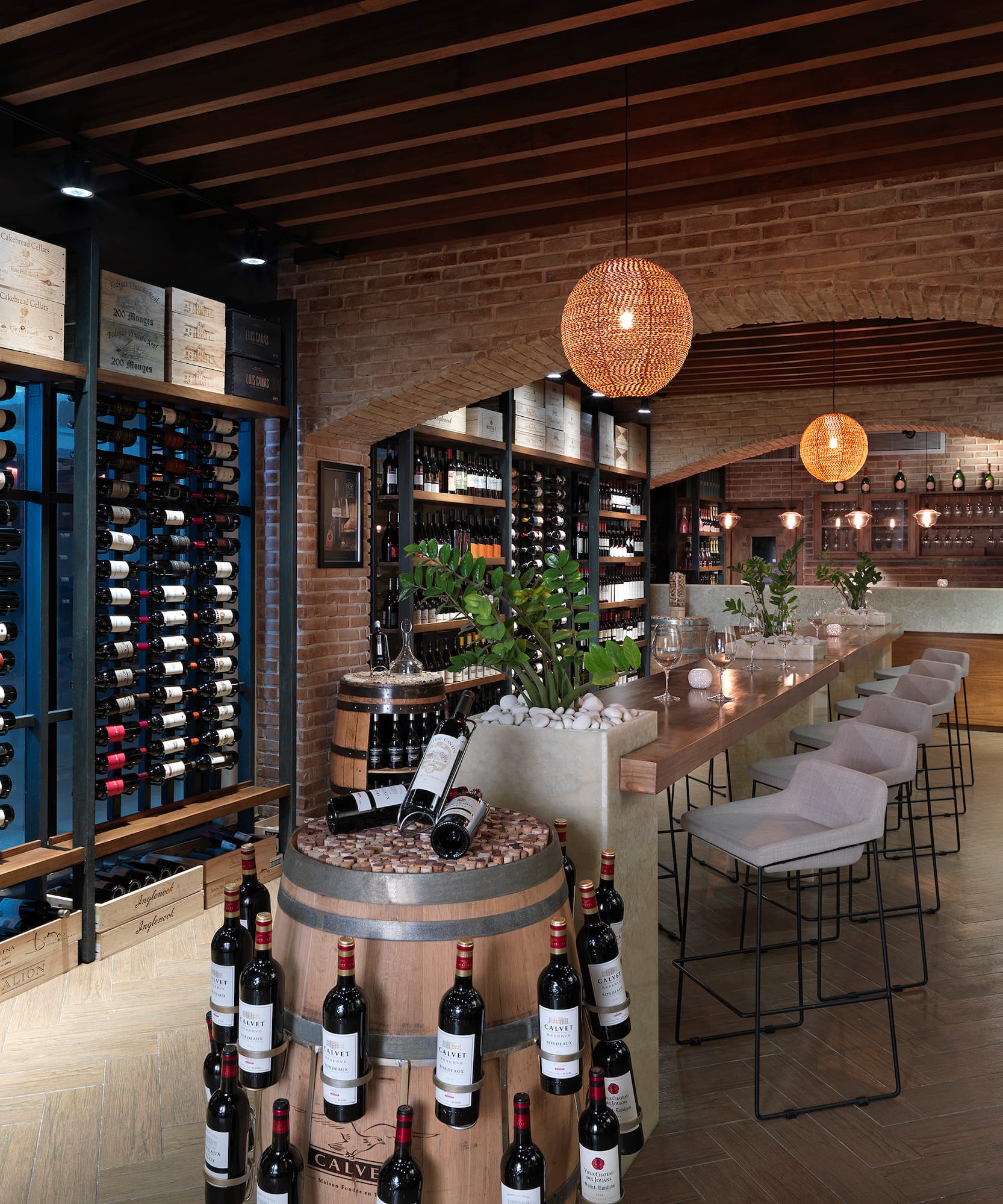 a wine cellar with wine bottles
