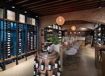 a wine cellar with wine bottles