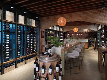 a wine cellar with wine bottles