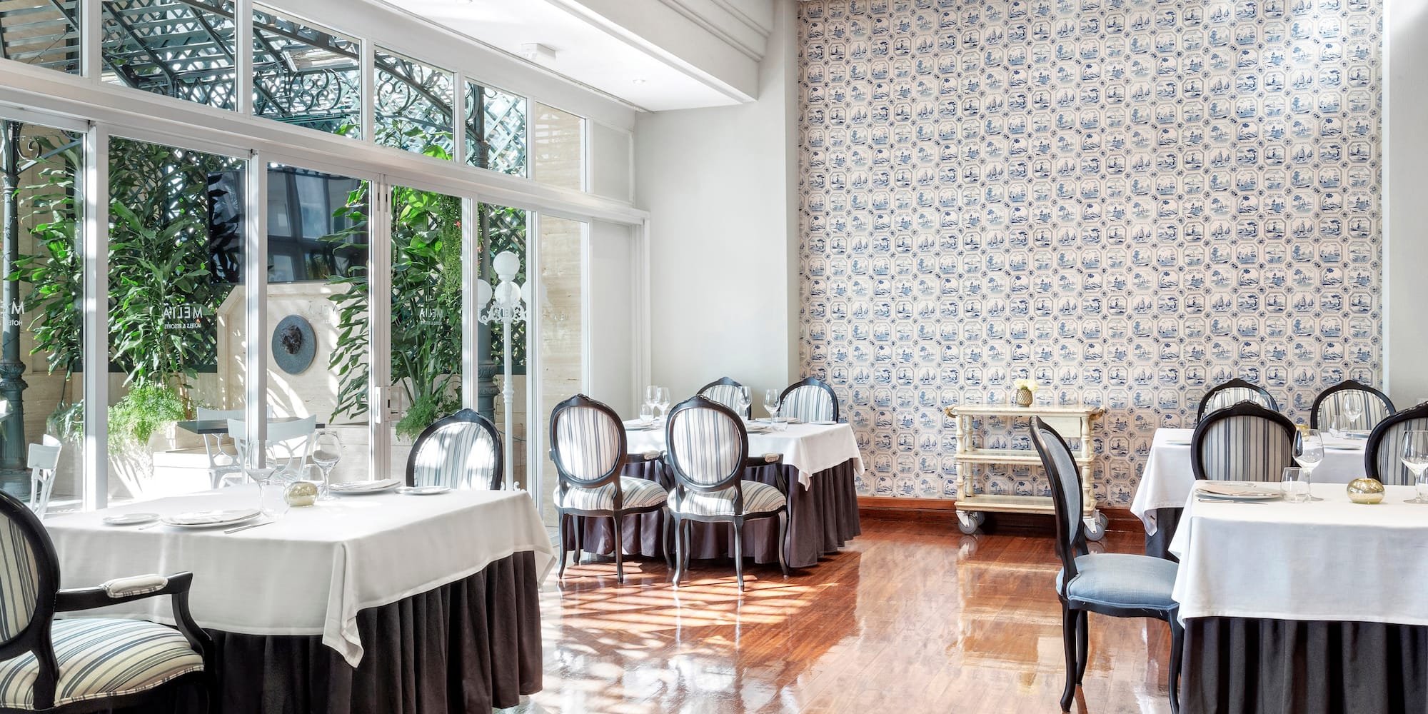 a room with tables and chairs