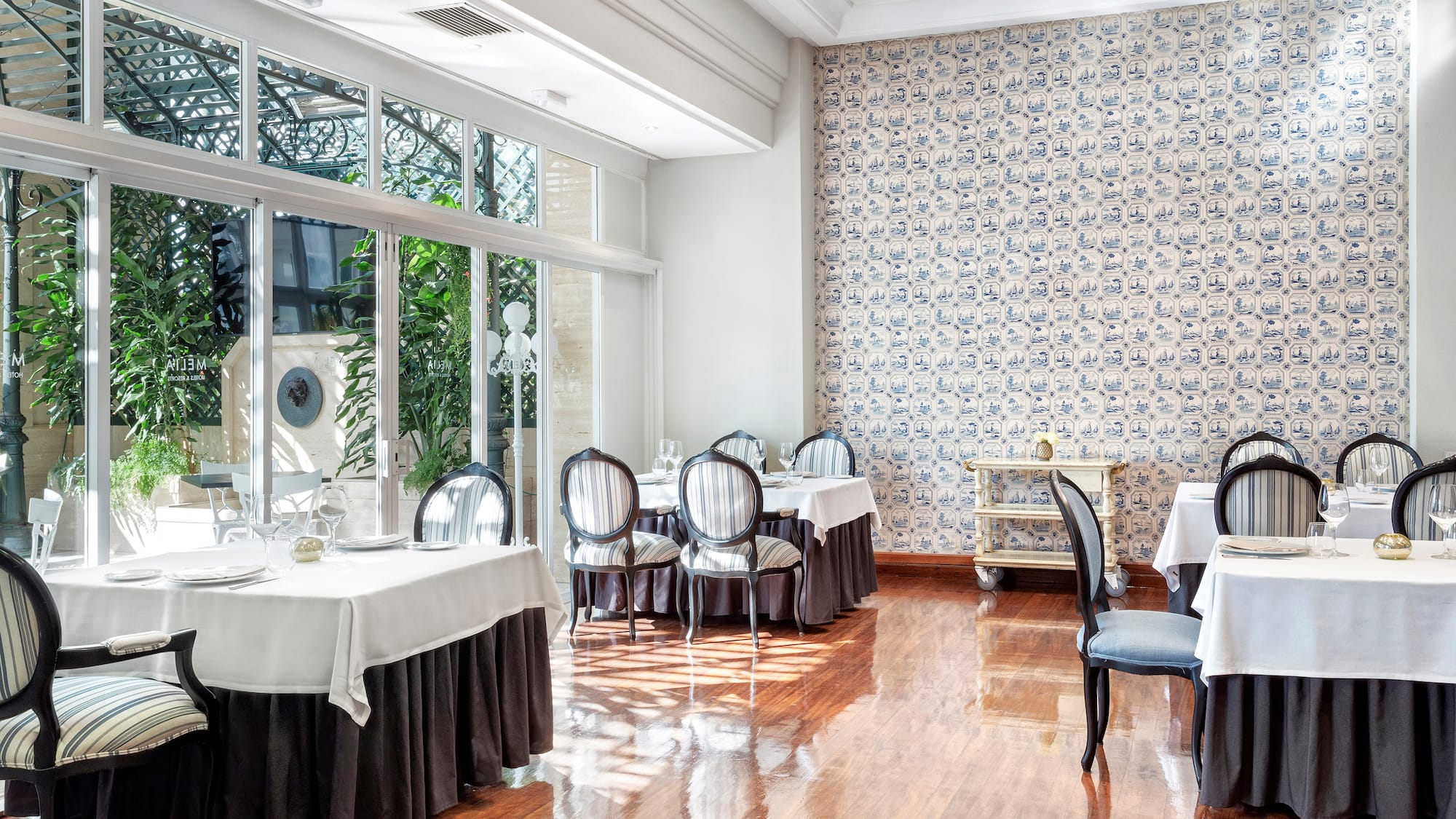 a room with tables and chairs