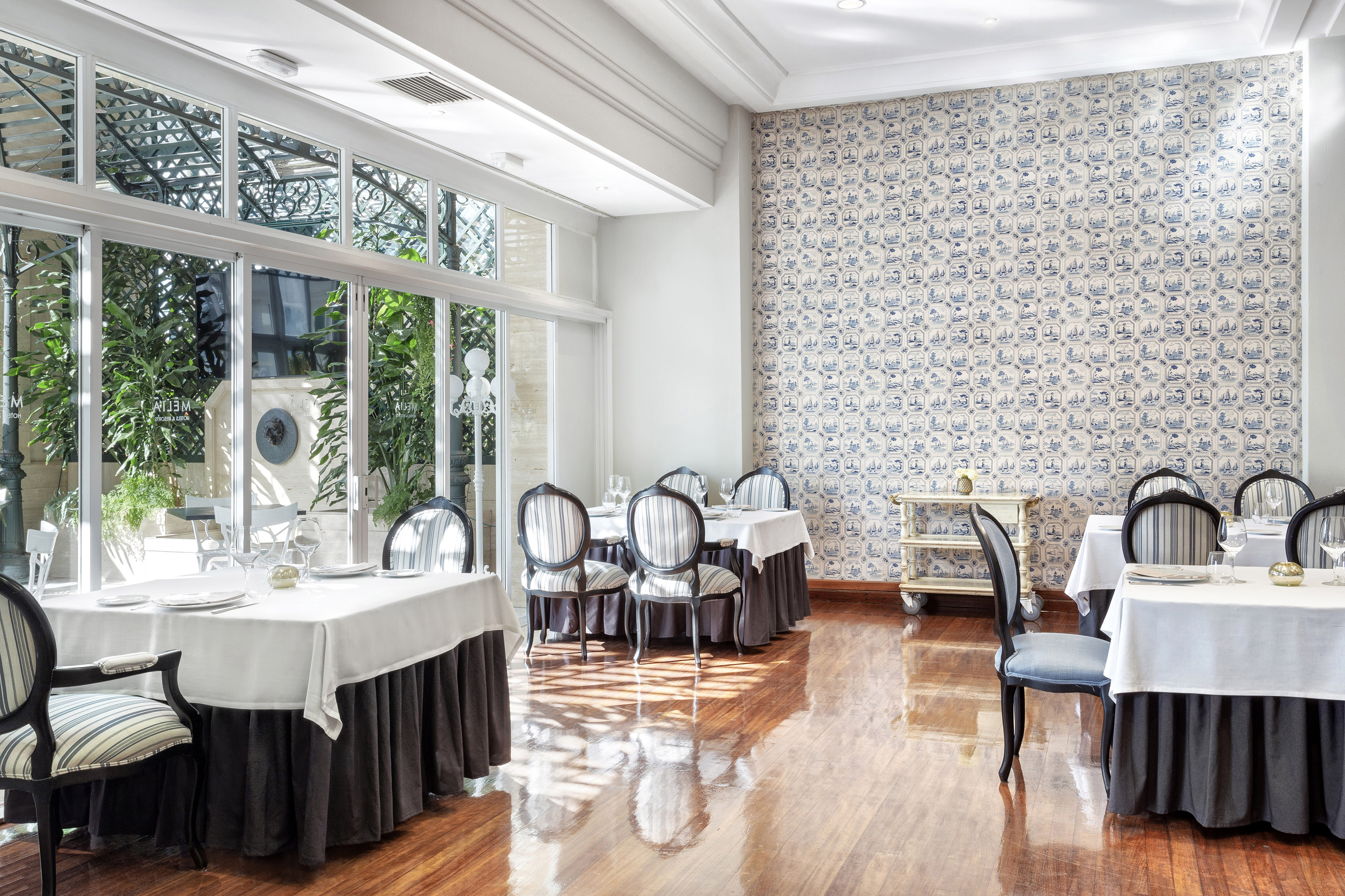 a room with tables and chairs