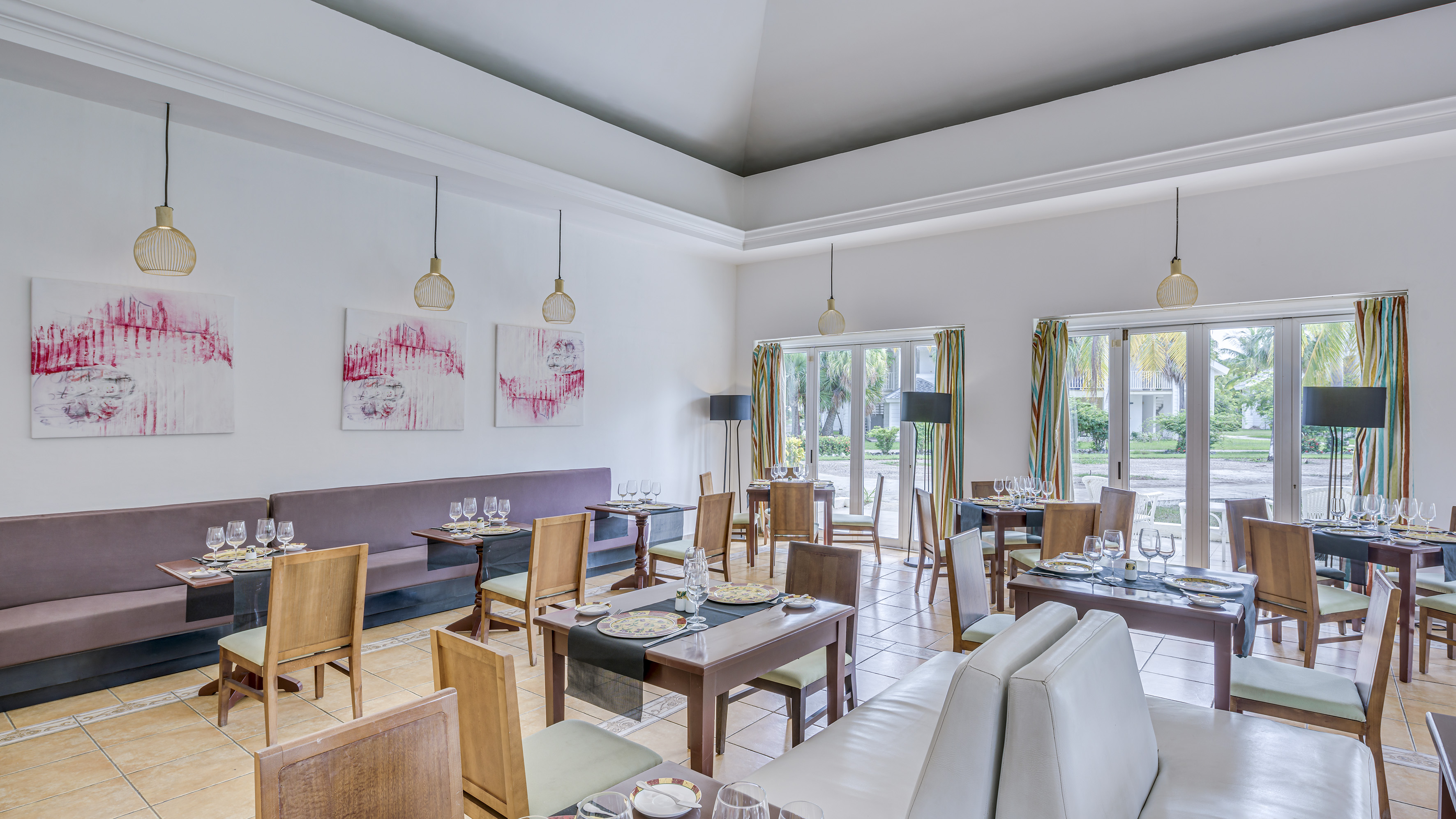 a room with tables and chairs