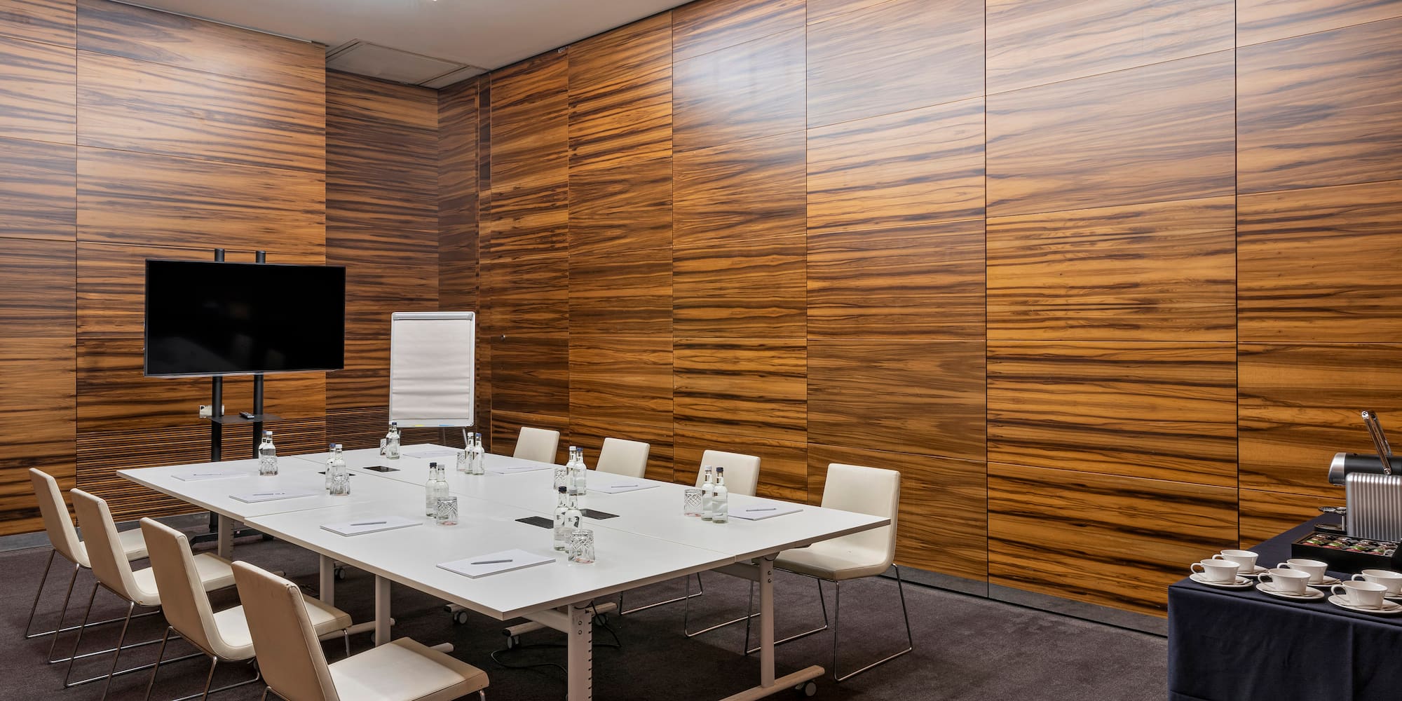 a room with a table and chairs