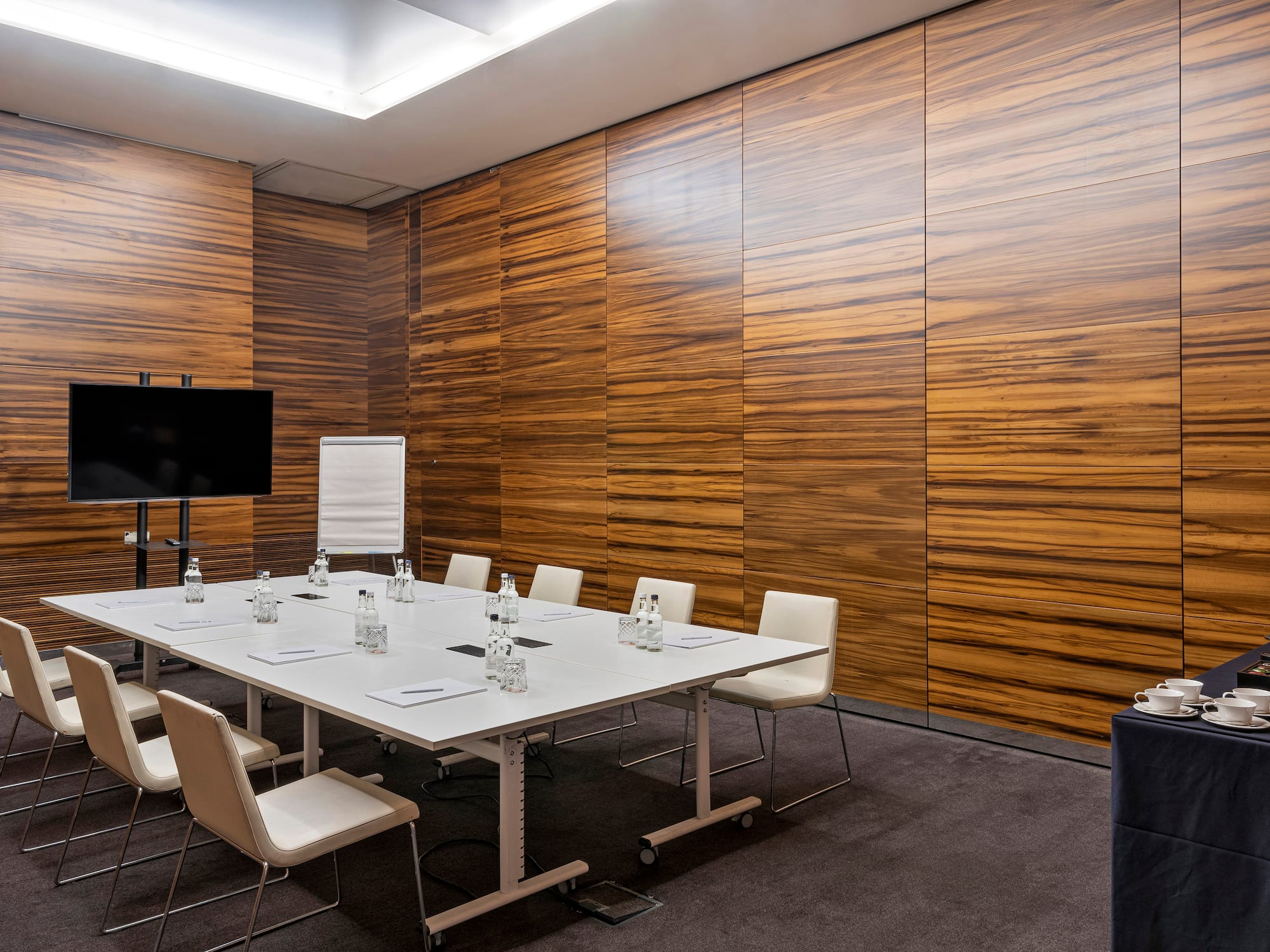 a room with a table and chairs