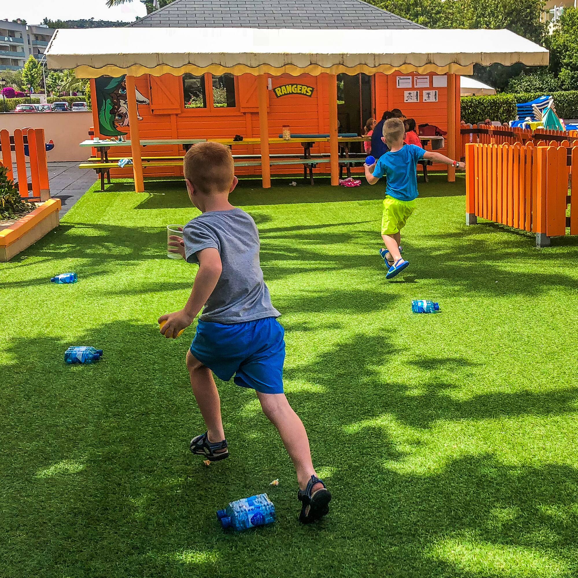 a group of kids playing in a playground